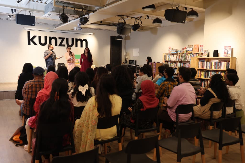 PB Flower addressing live audience at Kunzum bookstore